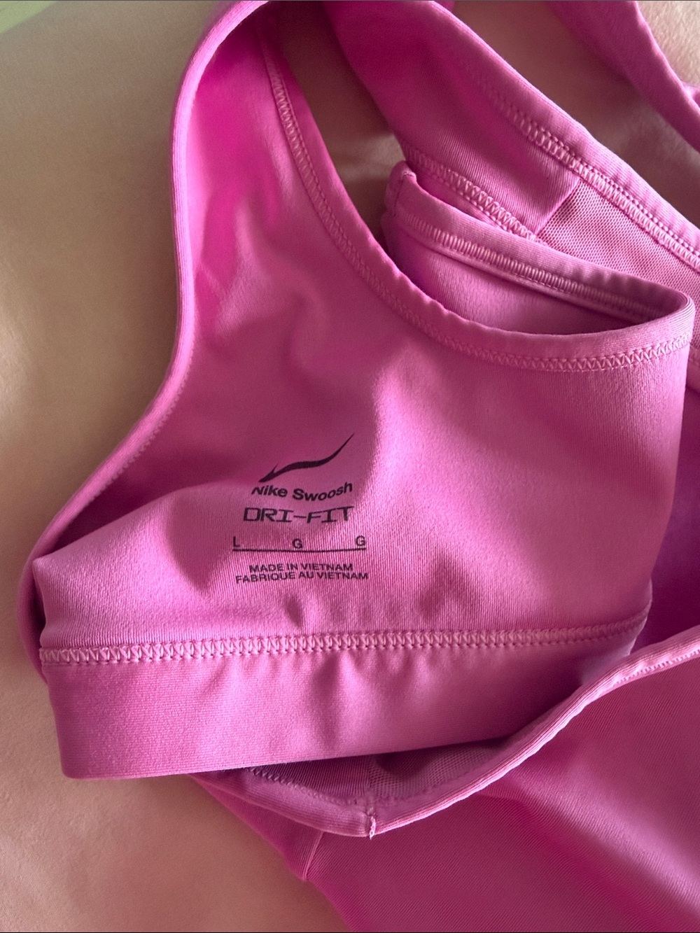Nike Pink Racerback Sports Bra with White Swoosh - Picture 3 of 3